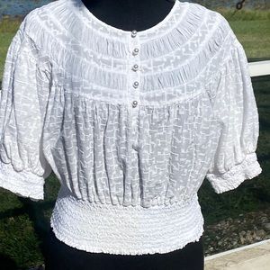 White, short sleeve, smoked waist, smocked at elbow, pearl buttons